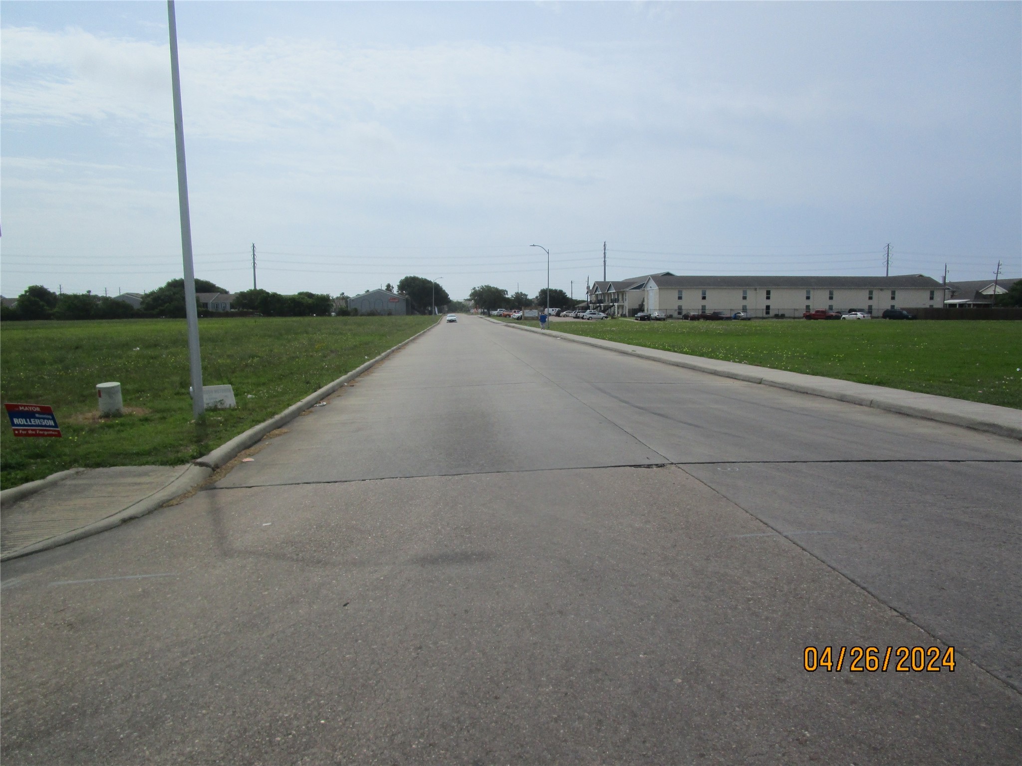 0 Skinner Street Freeport, TX 77541 - Photo 3 of 13 a view of a road with a big yard