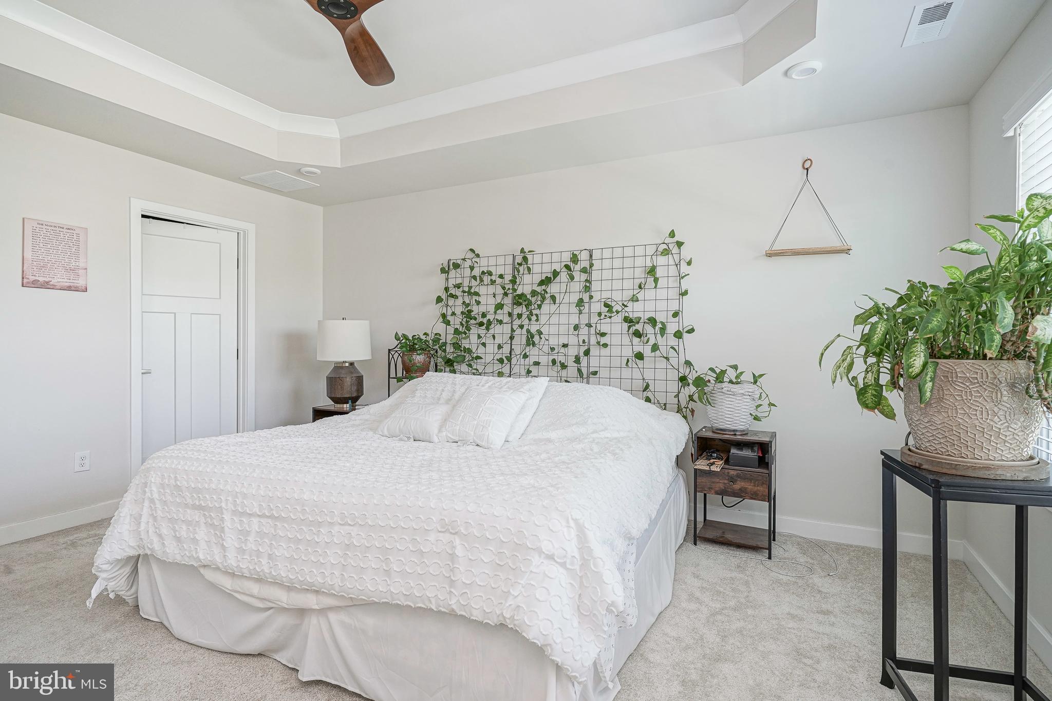 188 Freedom Way Sicklerville, NJ 08081 - Photo 15 of 32 a bedroom with a bed and a table