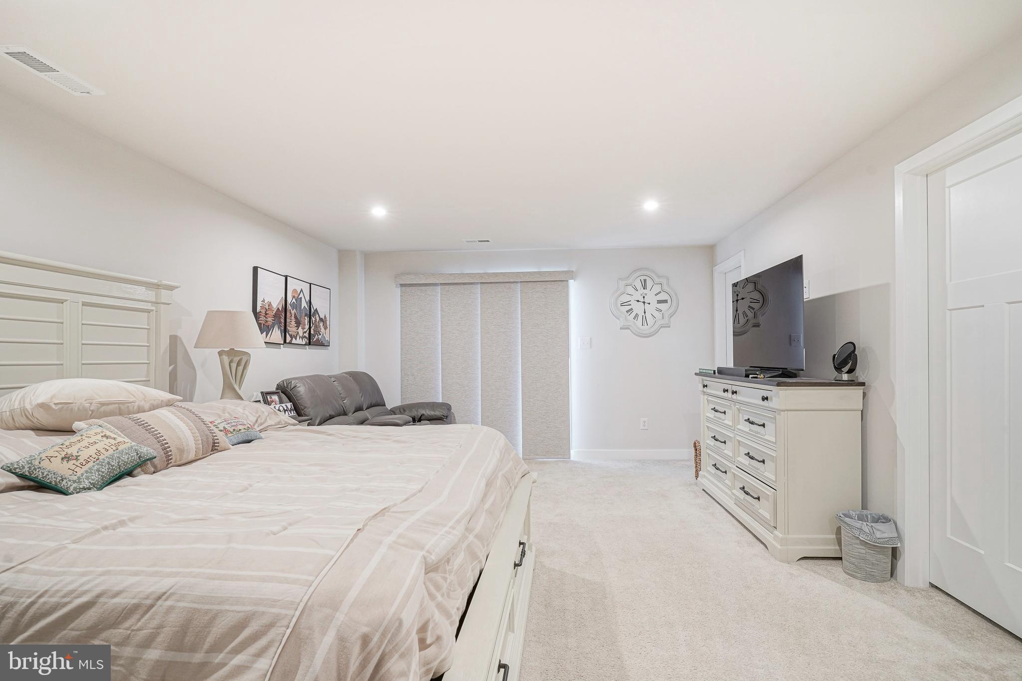 188 Freedom Way Sicklerville, NJ 08081 - Photo 18 of 32 a bedroom with a bed and a flat screen tv