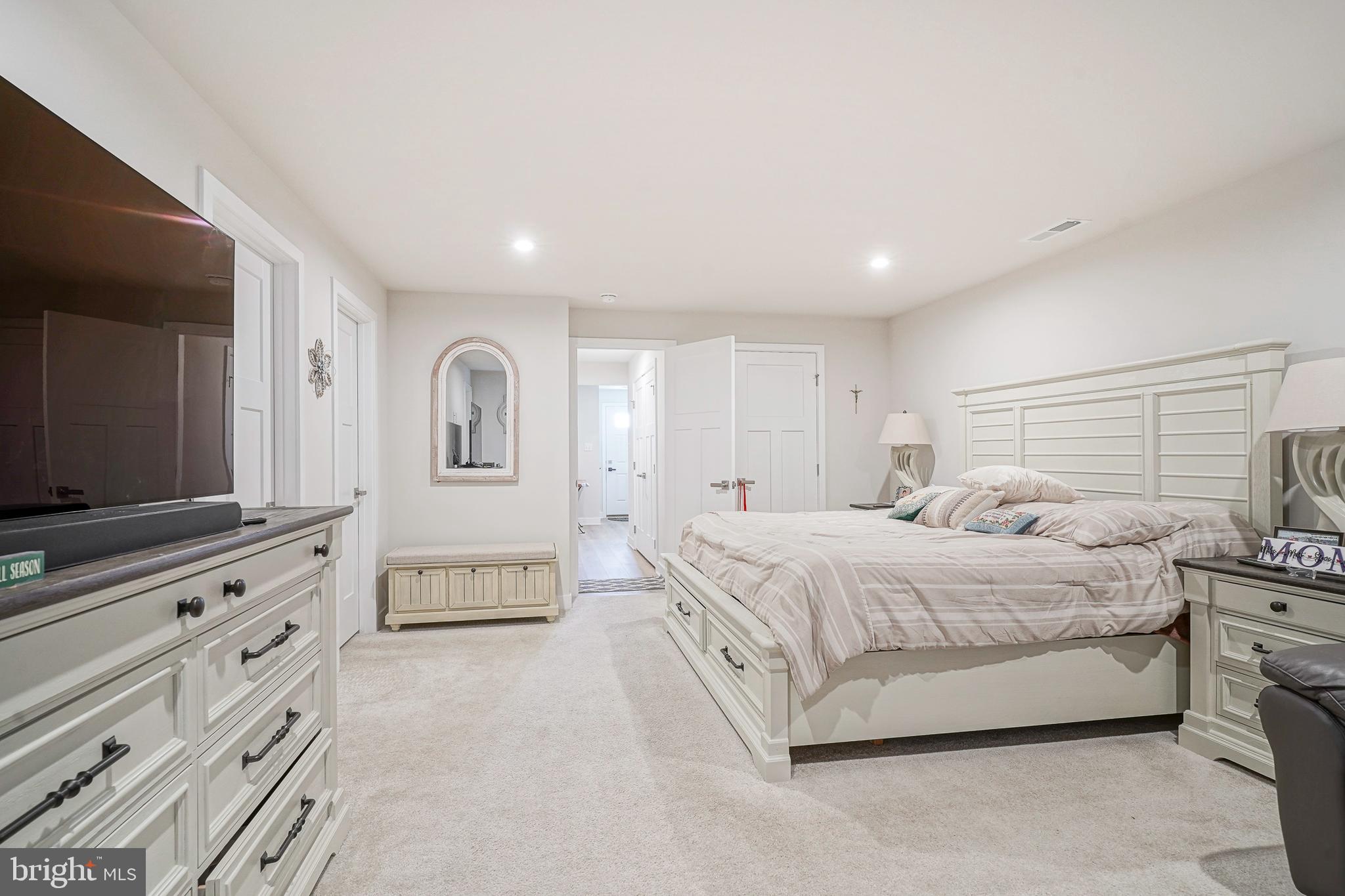 188 Freedom Way Sicklerville, NJ 08081 - Photo 19 of 32 a spacious bedroom with a bed and a flat screen television