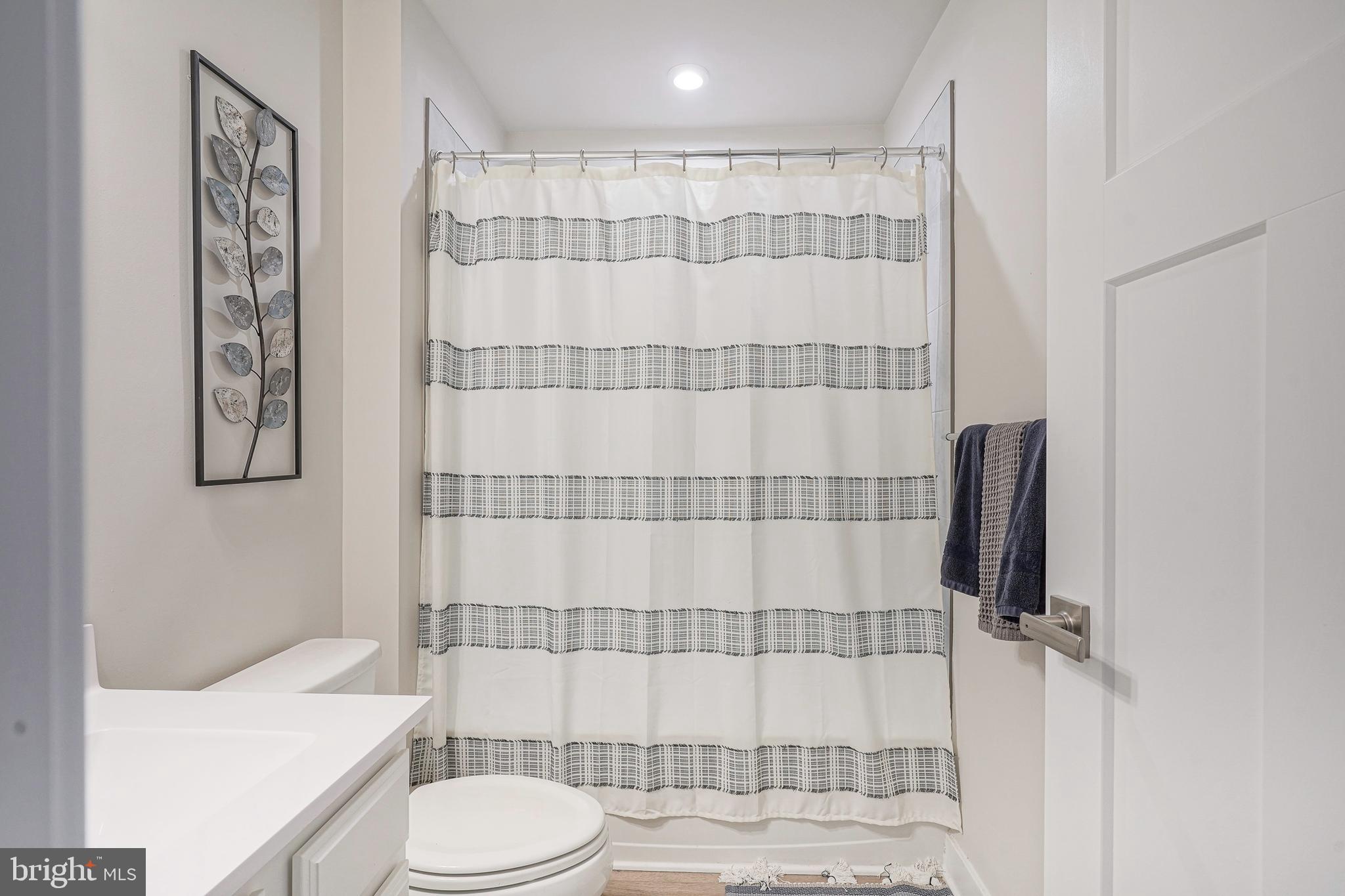 188 Freedom Way Sicklerville, NJ 08081 - Photo 22 of 32 a bathroom with a toilet and shower