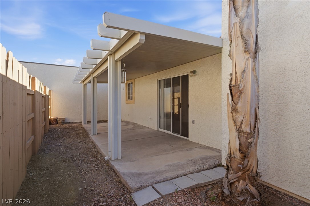 5449 Bugle Way, Unit 104 Las Vegas, NV 89108 - Photo 17 of 33 patio 1- This private patio offers a tranquil retreat for outdoor living and entertaining.
