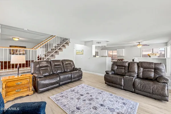 a living room with furniture and a couch
