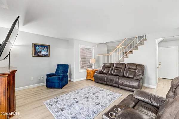 a living room with a couch and a coffee table