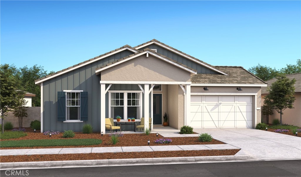 a front view of a house with garage