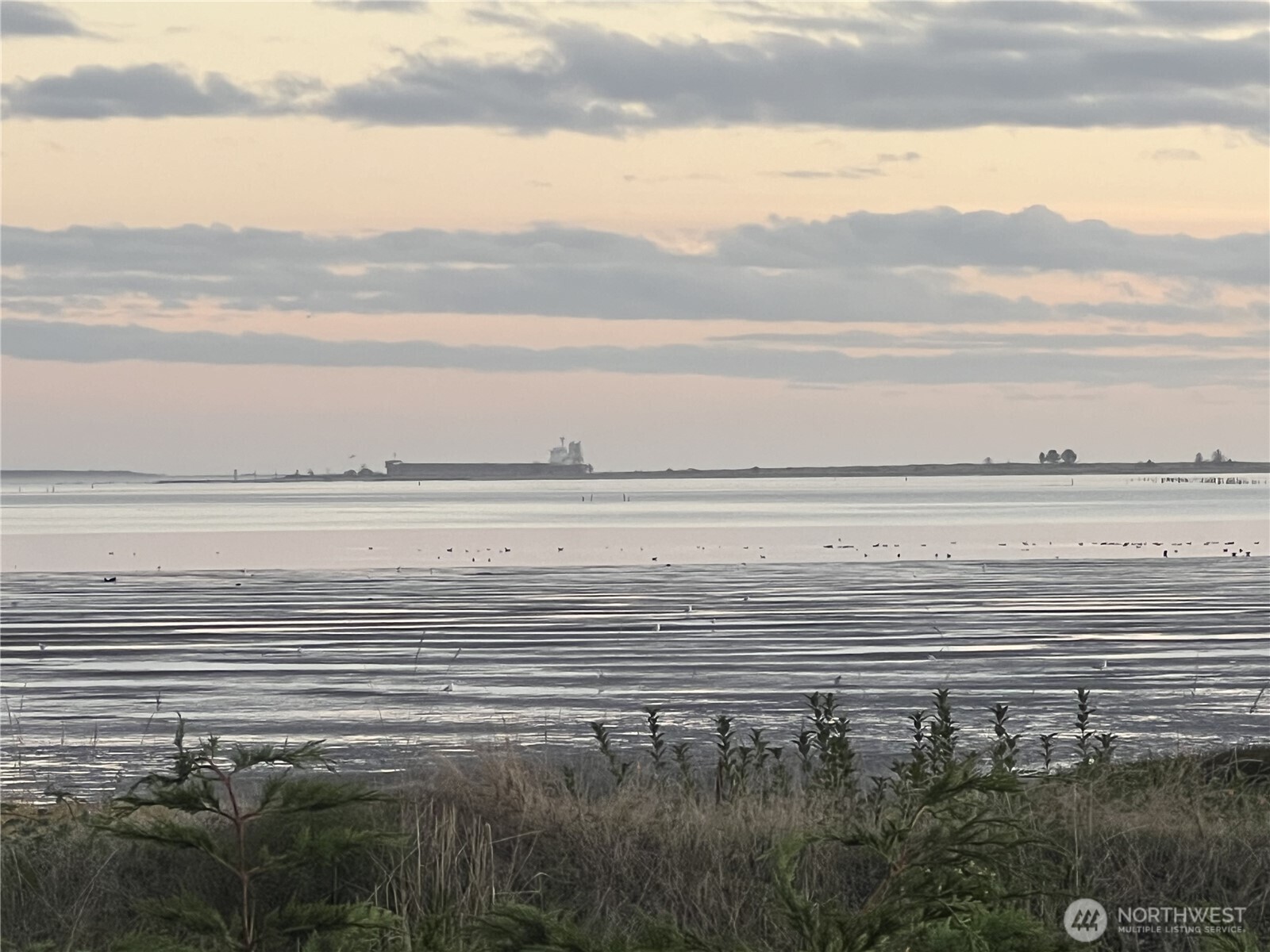 240 Stringtown Road Ilwaco, WA 98624 - Photo 28 of 39 a view of an ocean and mountain