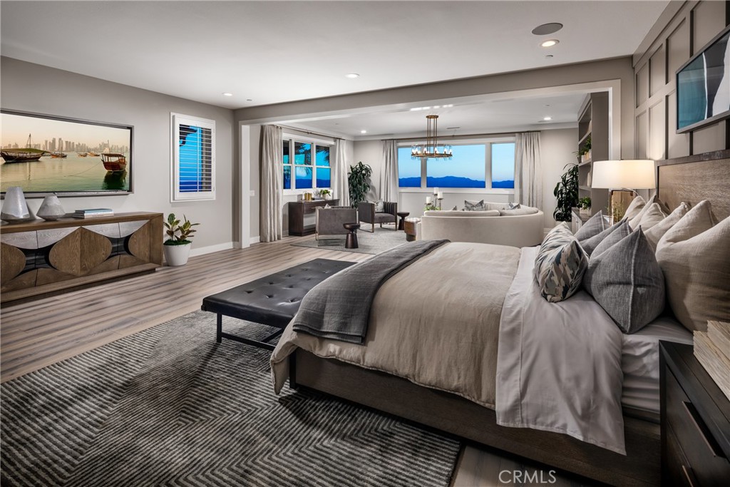 20320 Marlow Lane Porter Ranch, CA 91326 - Photo 11 of 16 a bedroom with furniture and a flat screen tv