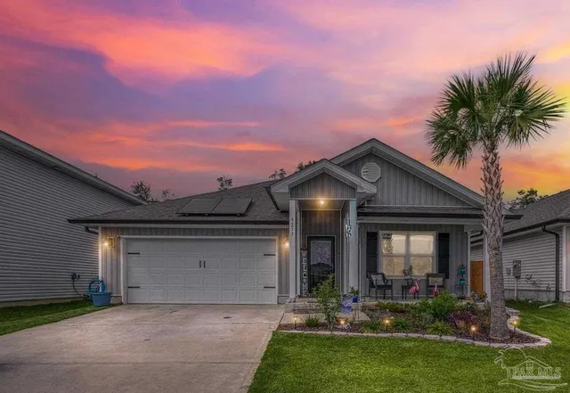 front view of a house with a yard