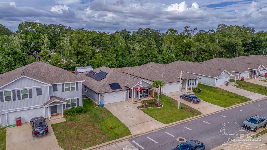 5277 Peach Drive Pace, FL 32571 - Photo 29 of 31 an aerial view of a house with a garden