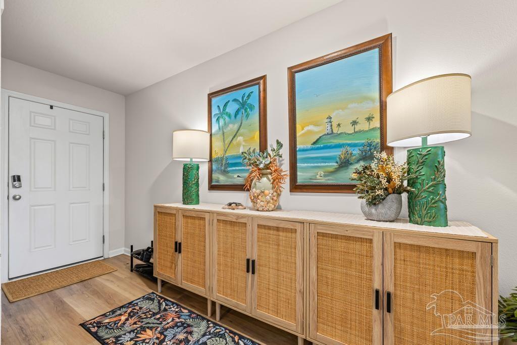 5277 Peach Drive Pace, FL 32571 - Photo 6 of 31 wooden floor in a bedroom