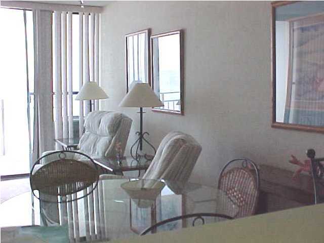 381 Santa Rosa Boulevard, Unit W515 Fort Walton Beach, FL 32548 - Photo 4 of 10 a view of a livingroom with furniture and a window