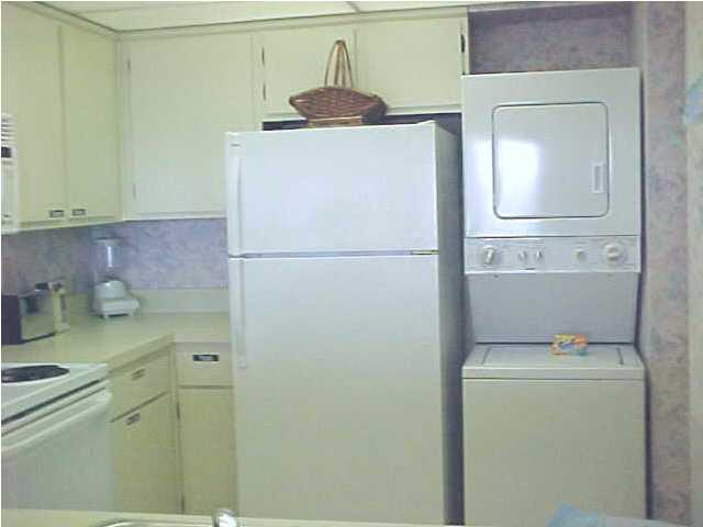 381 Santa Rosa Boulevard, Unit W515 Fort Walton Beach, FL 32548 - Photo 7 of 10 a utility room with dryer and washer