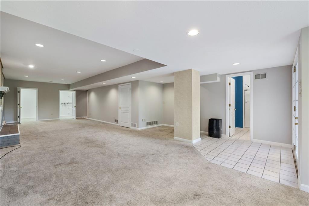 241 Guckert Lane Wexford, PA 15090 - Photo 34 of 47 Finsihed Basement with Fireplace and Full Bath.