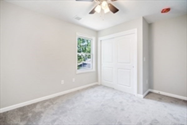 16 Ivan Springfield, MA 01104 - Photo 14 of 27 an empty room with a empty space and a window