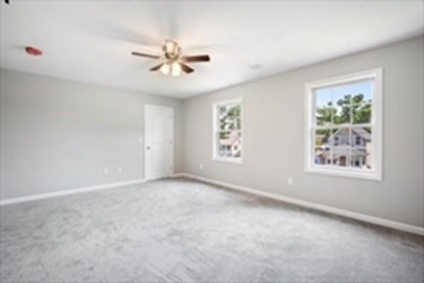 16 Ivan Springfield, MA 01104 - Photo 17 of 27 an empty room with windows and fan