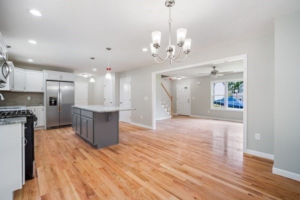 16 Ivan Springfield, MA 01104 - Photo 9 of 27 a view of a kitchen with a sink and wooden floor