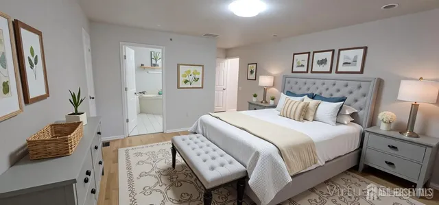 a bedroom with bed and a window