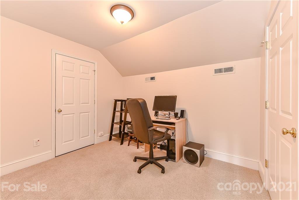 1405 Lilac Road Charlotte, NC 28209 - Photo 27 of 39 a view of a workspace with furniture