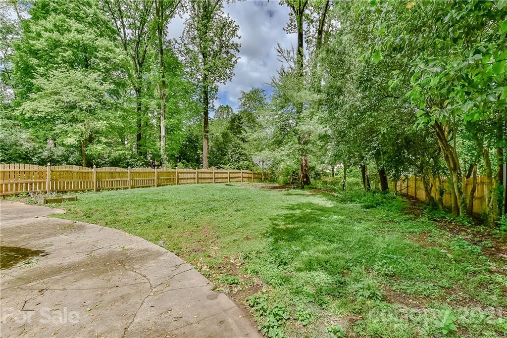 1405 Lilac Road Charlotte, NC 28209 - Photo 33 of 39 a view of a park with large trees