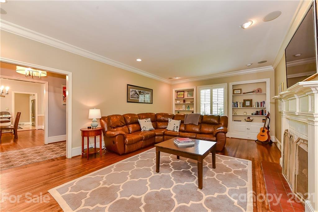 1405 Lilac Road Charlotte, NC 28209 - Photo 6 of 39 a living room with furniture and a table