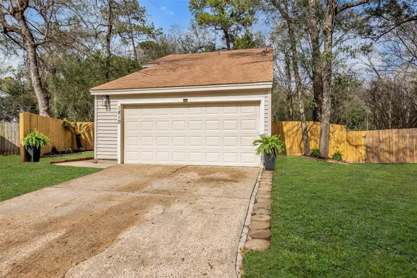 a city street lined with buildings and trees