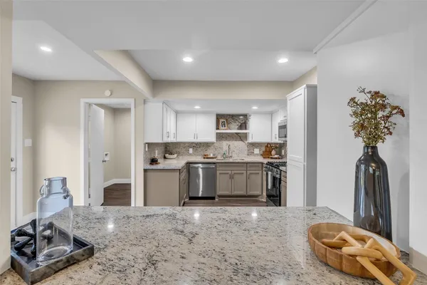 a view of a lake with a yard