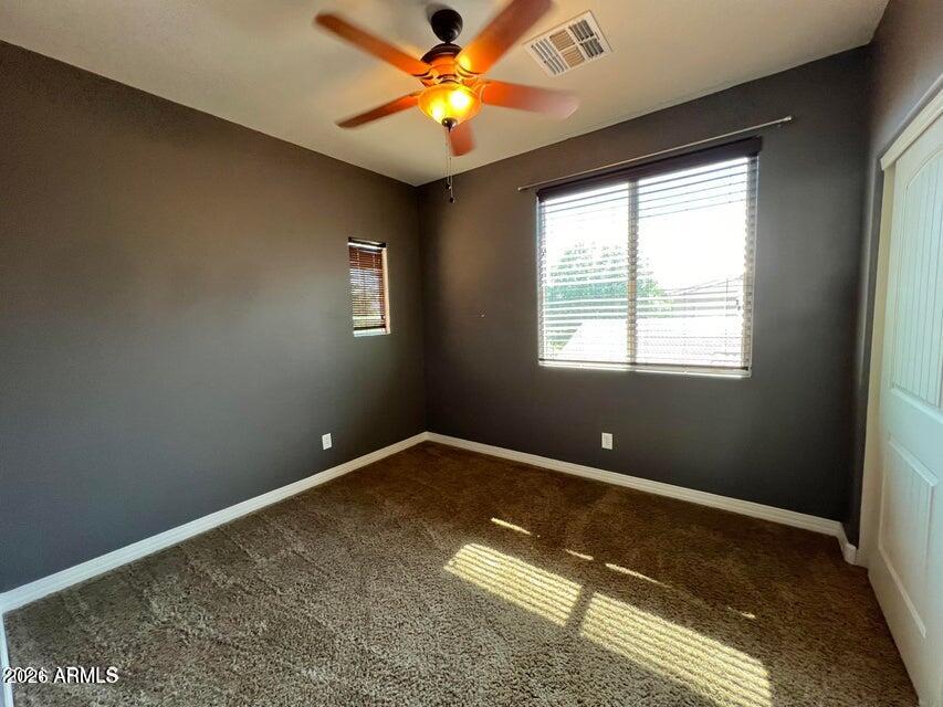 3886 East Rawhide Street Gilbert, AZ 85296 - Photo 29 of 52 a view of room with window and ceiling fan