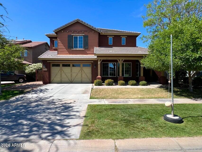 3886 East Rawhide Street Gilbert, AZ 85296 - Photo 3 of 52 a view of a house with a yard