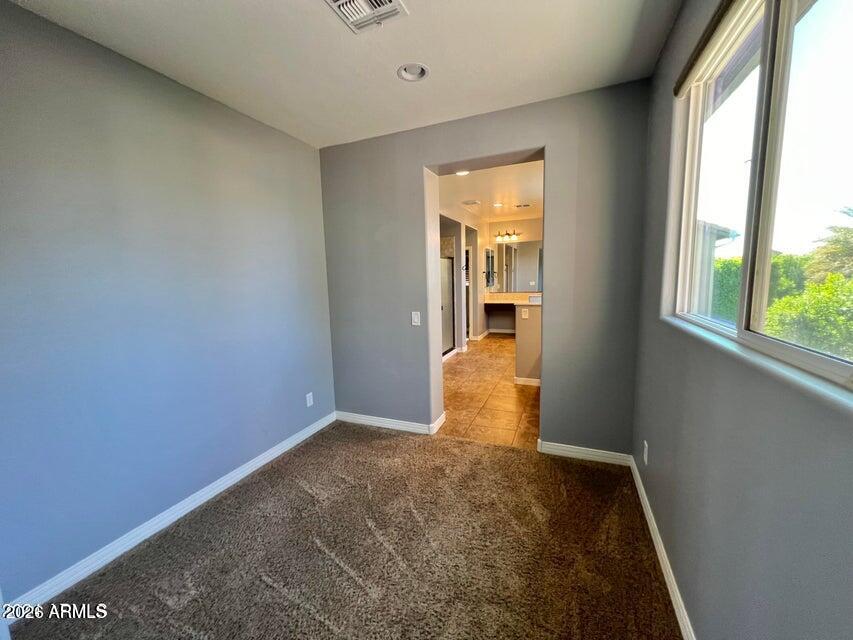 3886 East Rawhide Street Gilbert, AZ 85296 - Photo 33 of 52 an empty room with windows