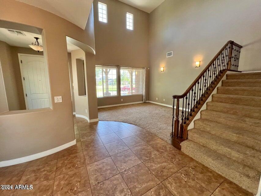 3886 East Rawhide Street Gilbert, AZ 85296 - Photo 4 of 52 a view of entryway and hall with a window