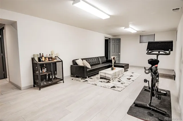 a view of a workspace with furniture