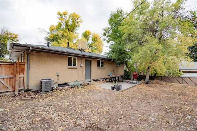 a backyard of a house with seating space