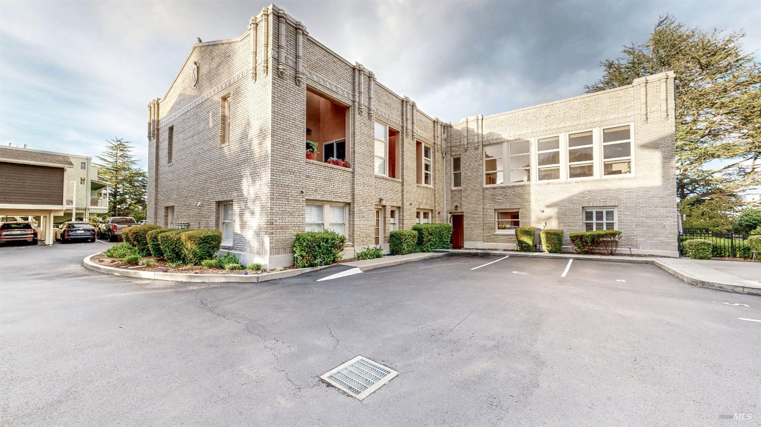 331 Keller Street, Unit 11 Petaluma, CA 94952 - Photo 1 of 1 a view of a building with sitting area