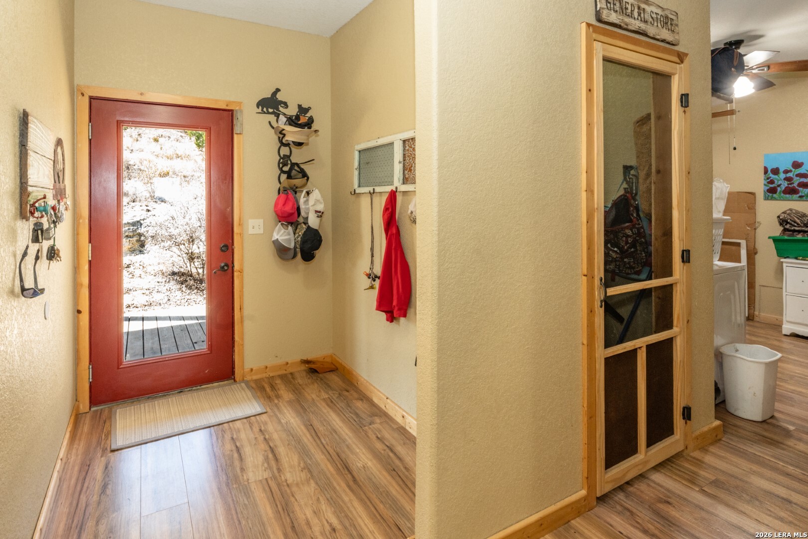 1079 County Road 357 Utopia, TX 78884 - Photo 19 of 36 a view of walk in closet with clothes and shoes