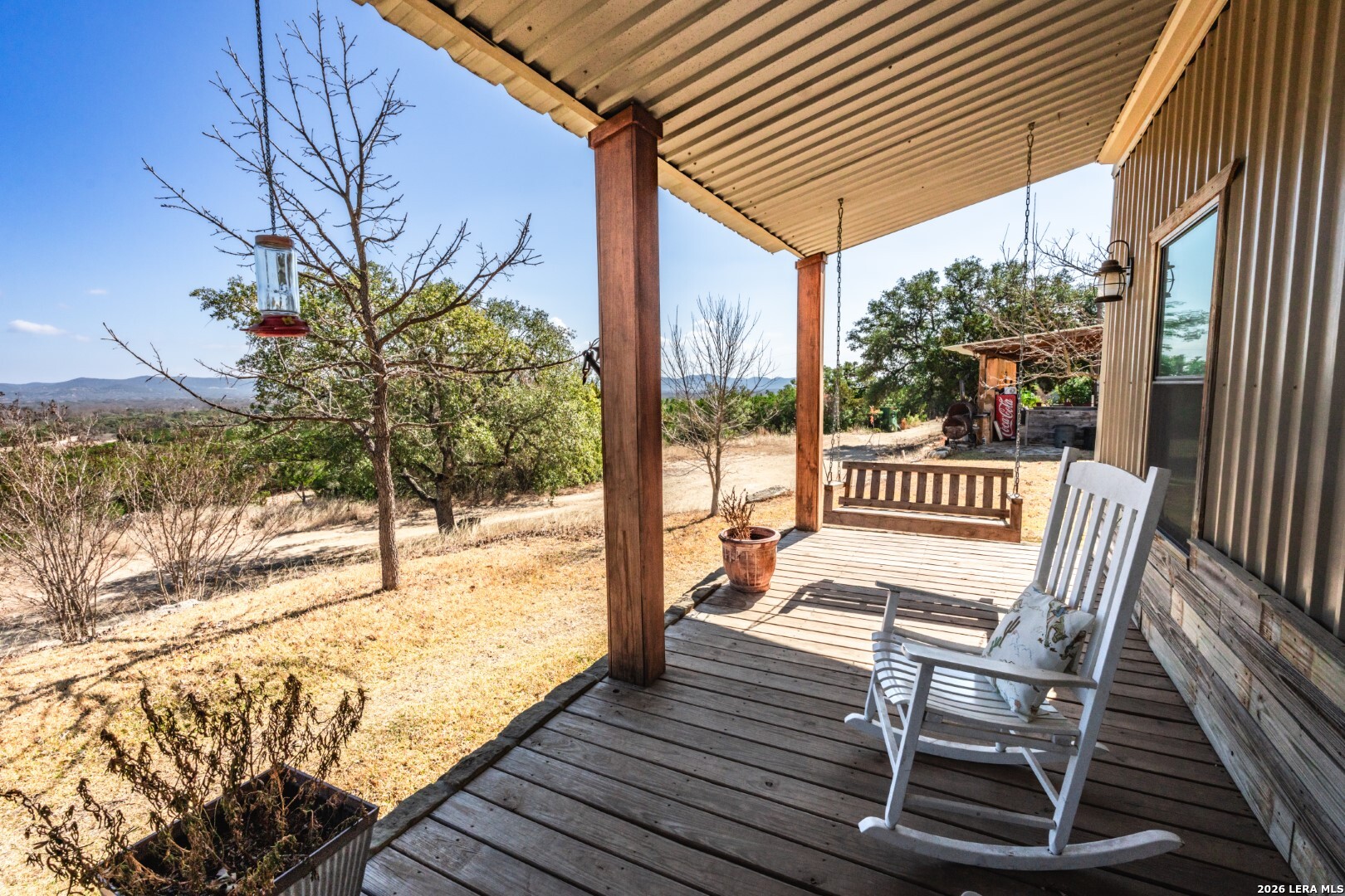 1079 County Road 357 Utopia, TX 78884 - Photo 22 of 36 a view of a chairs with a porch