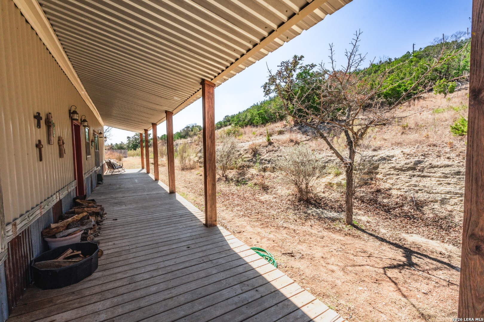 1079 County Road 357 Utopia, TX 78884 - Photo 25 of 36 a view of a patio with wooden floor