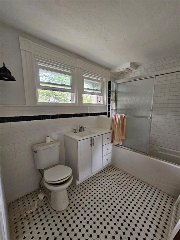 764 Rock Street, Unit 2 Fall River, MA 02720 - Photo 16 of 17 a bathroom with a sink toilet and shower
