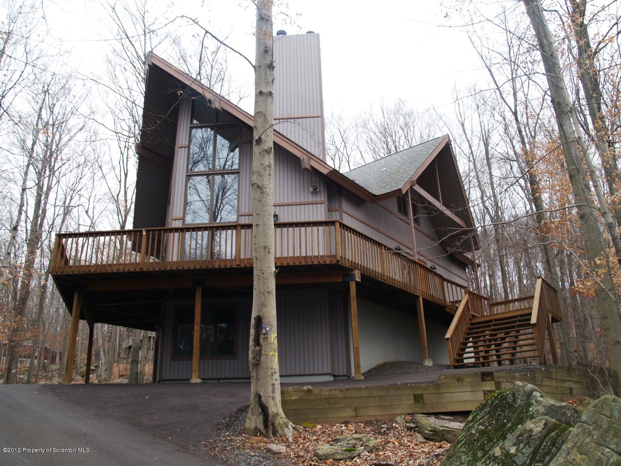 3062 Northgate Road Lake Ariel, PA 18436 - Photo 1 of 22 a front view of a house with balcony