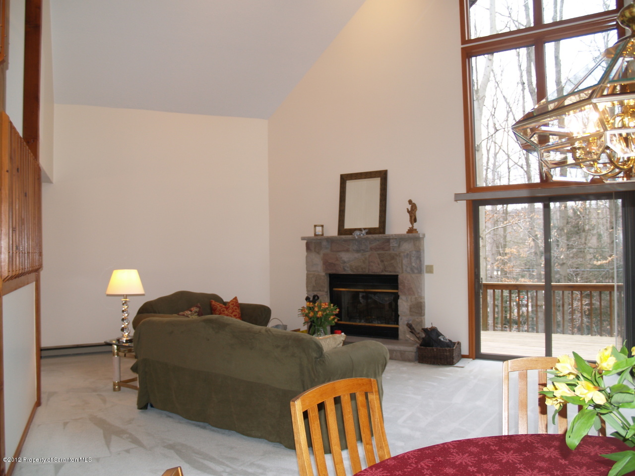 3062 Northgate Road Lake Ariel, PA 18436 - Photo 16 of 22 a living room with furniture and a fireplace