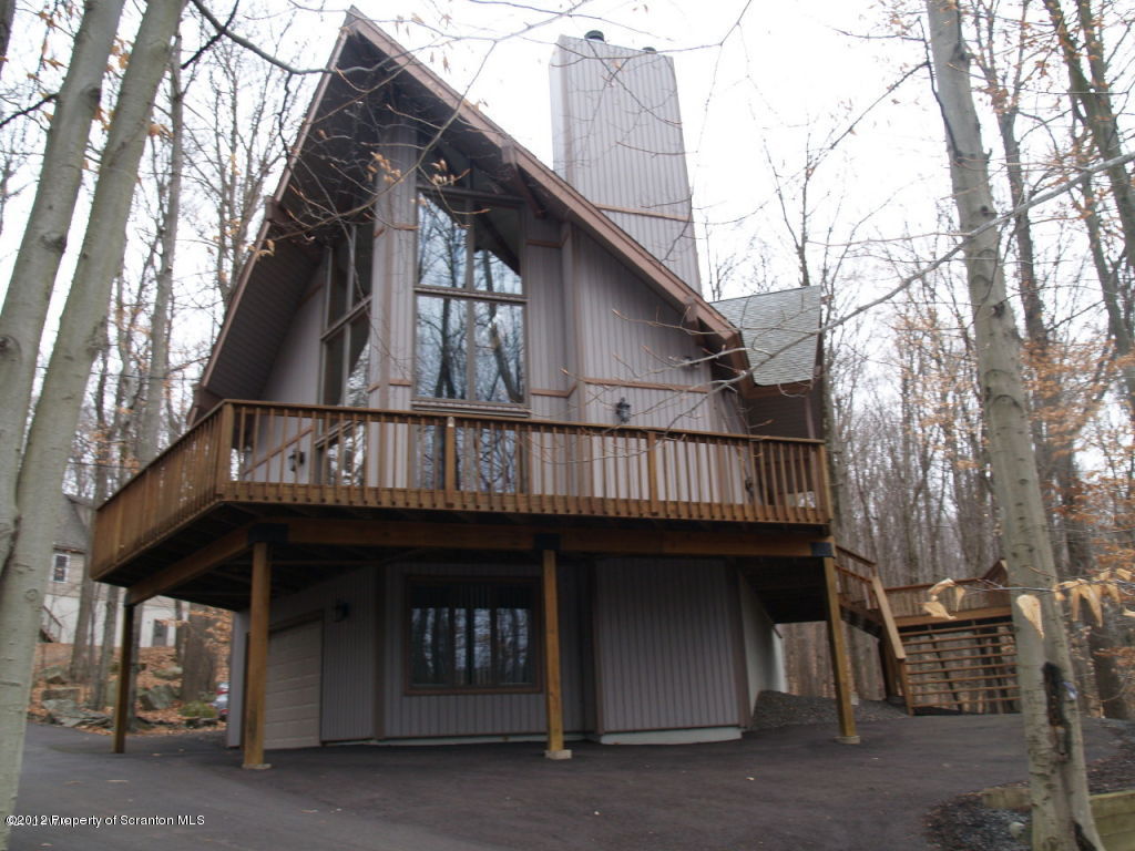 3062 Northgate Road Lake Ariel, PA 18436 - Photo 2 of 22 a view of a house with wooden deck