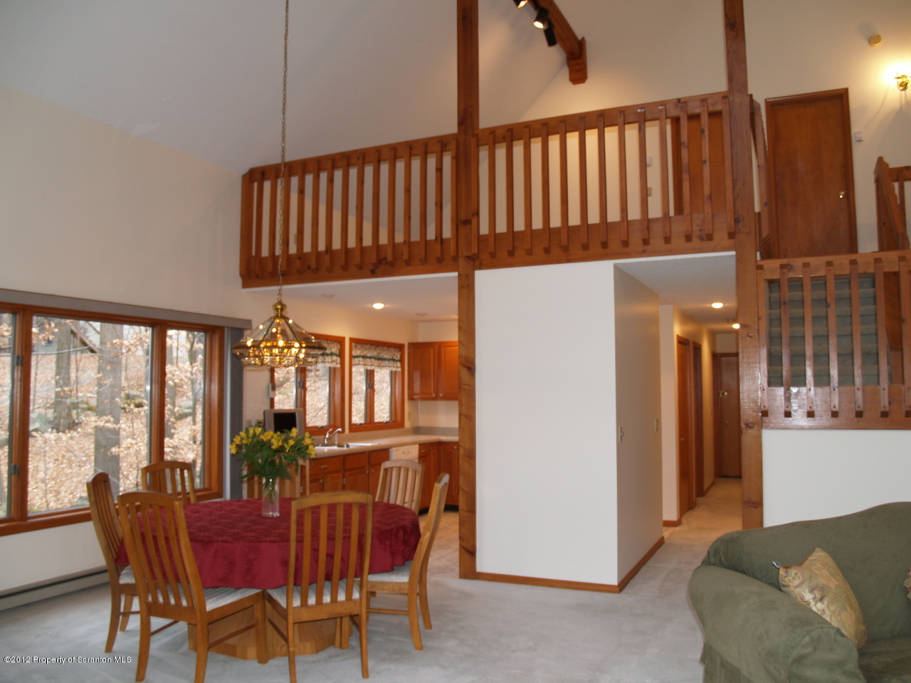3062 Northgate Road Lake Ariel, PA 18436 - Photo 8 of 22 a view of a dining room with furniture window and wooden floor