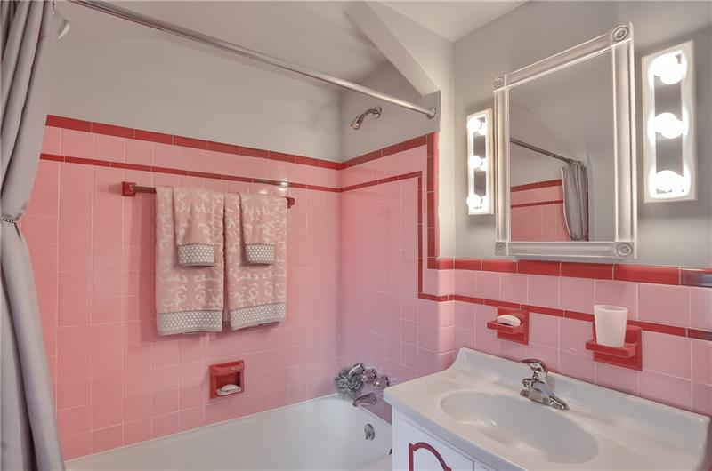203 Gass Road Pittsburgh, PA 15229 - Photo 15 of 25 The shared hall bath has been meticulously cared for and features a tiled tub/shower combo.