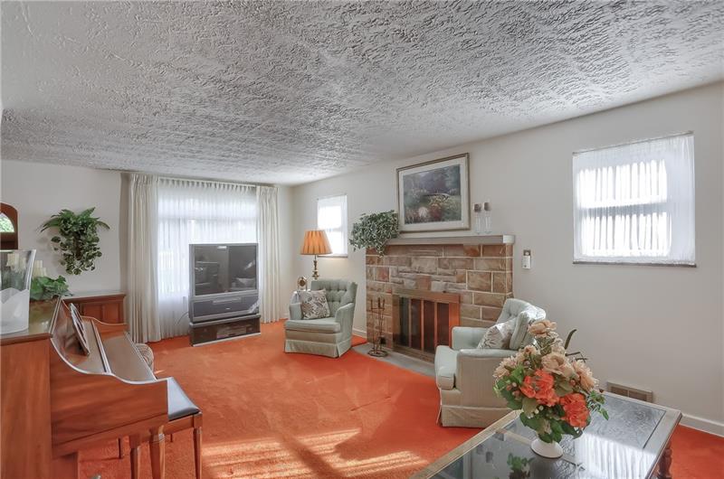 Generous sunlight floods the living room.  