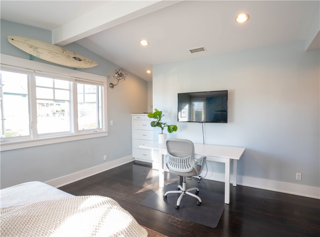 562 24th Place Hermosa Beach, CA 90254 - Photo 30 of 75 a living room with furniture a flat screen tv and a large window