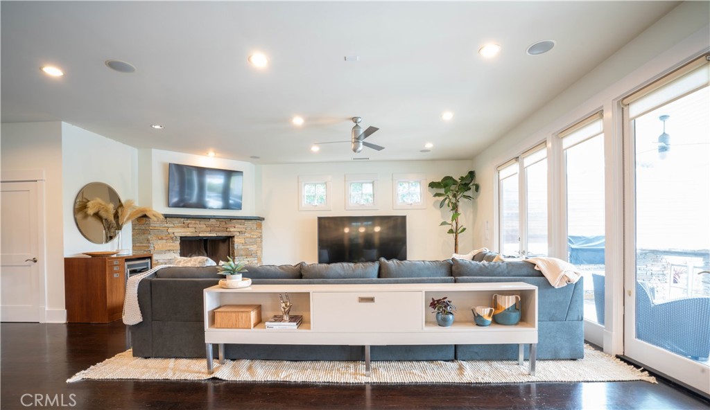 562 24th Place Hermosa Beach, CA 90254 - Photo 4 of 75 a living room with fireplace furniture and a flat screen tv