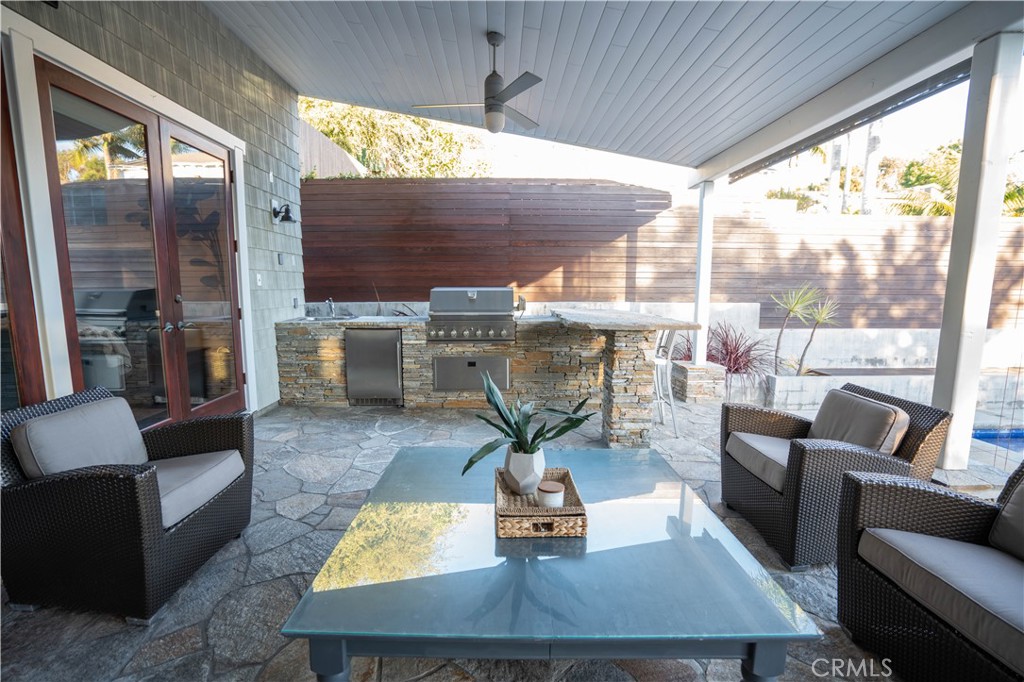 562 24th Place Hermosa Beach, CA 90254 - Photo 51 of 75 a living room with fireplace furniture and a large window