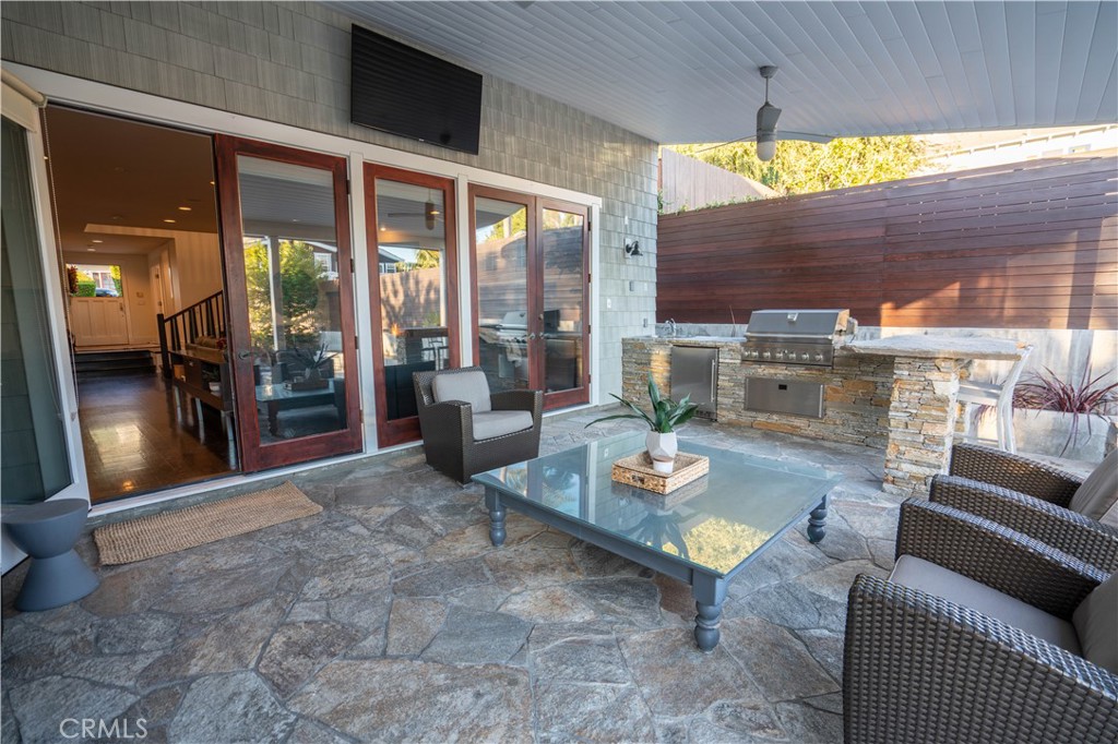 562 24th Place Hermosa Beach, CA 90254 - Photo 54 of 75 a living room with furniture and a floor to ceiling window