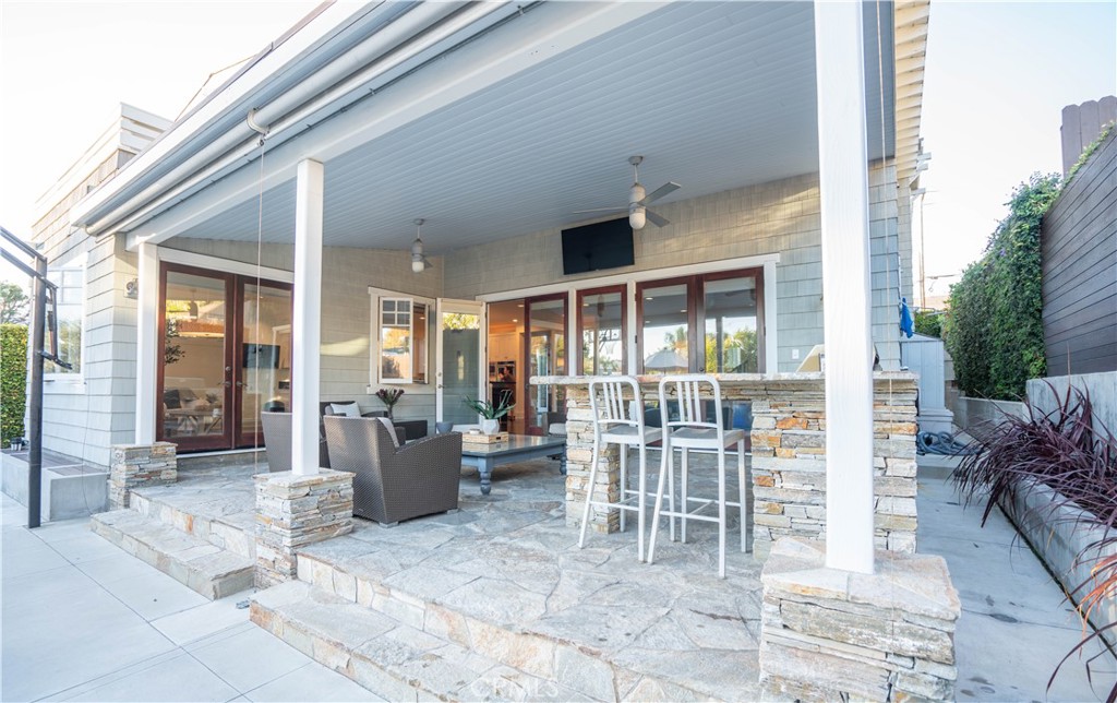 562 24th Place Hermosa Beach, CA 90254 - Photo 55 of 75 a view of a patio with table and chairs and potted plants