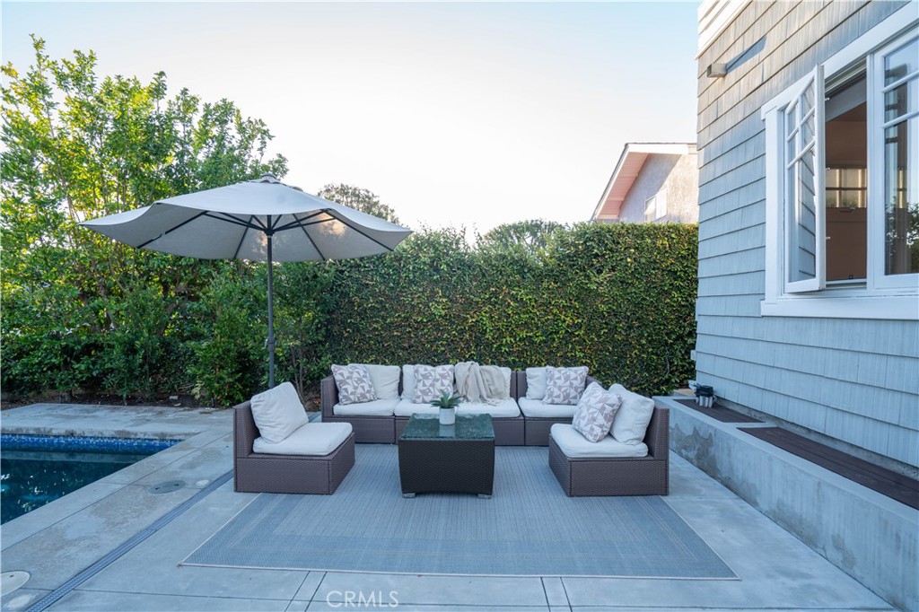 562 24th Place Hermosa Beach, CA 90254 - Photo 57 of 75 a view of a patio with couches and a potted plant on a table