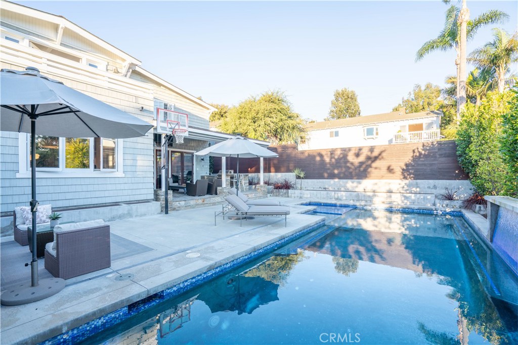 562 24th Place Hermosa Beach, CA 90254 - Photo 58 of 75 a view of a house with pool and chairs